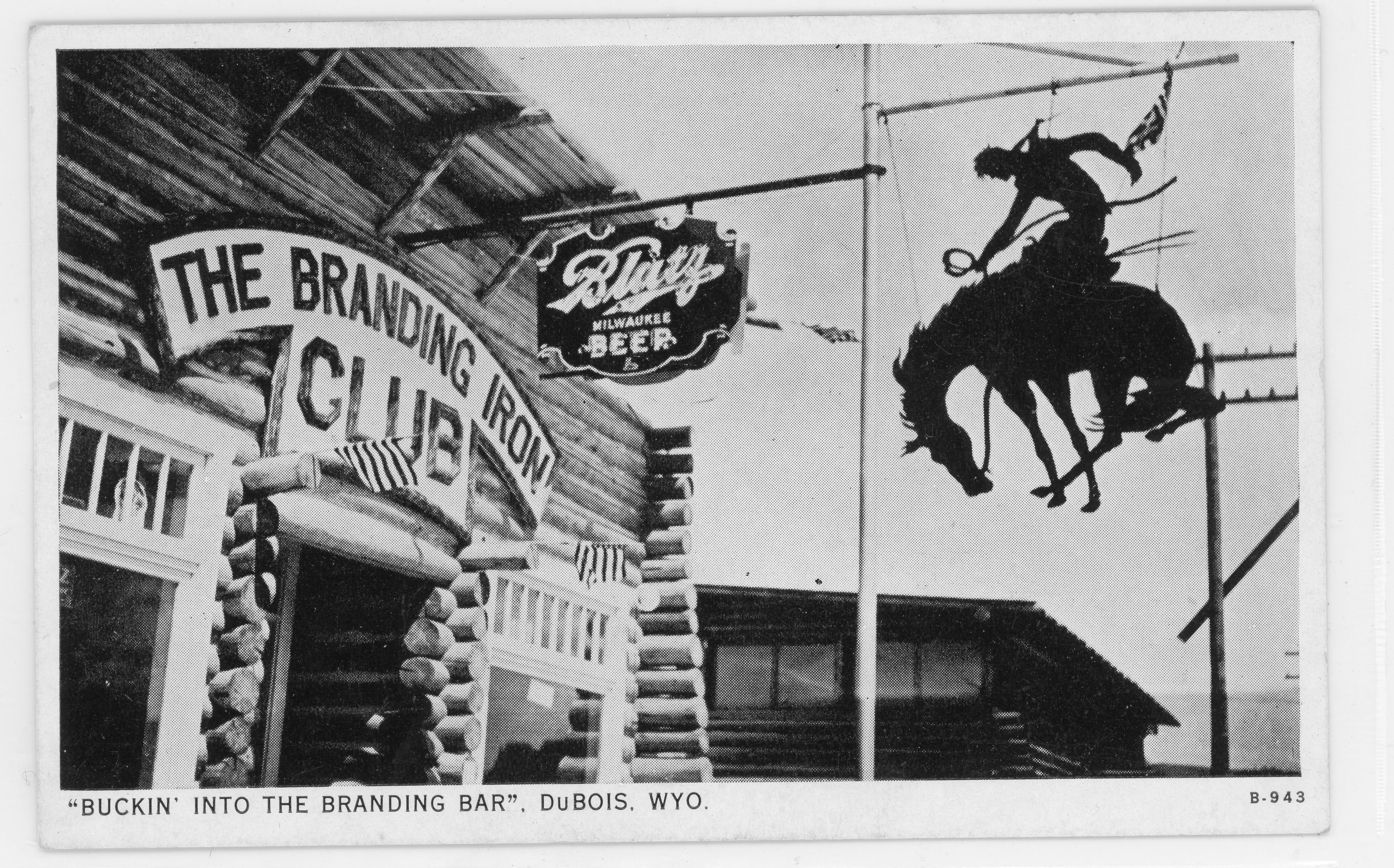 Historic black-and-white postcard showing the exterior of The Branding Iron Club in Dubois, Wyoming, with a log building, hanging beer sign, and silhouetted bucking bronc figure, captioned “Buckin’ into the Branding Bar,” Dubois, Wyo.